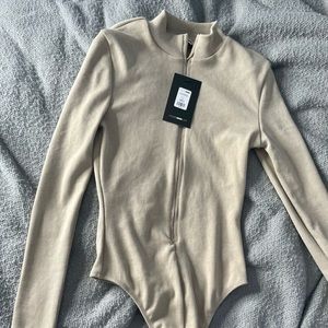 TAN TURTLE NECK BODY SUIT